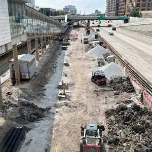 CTA tracks under construction with bulldozers and rubble